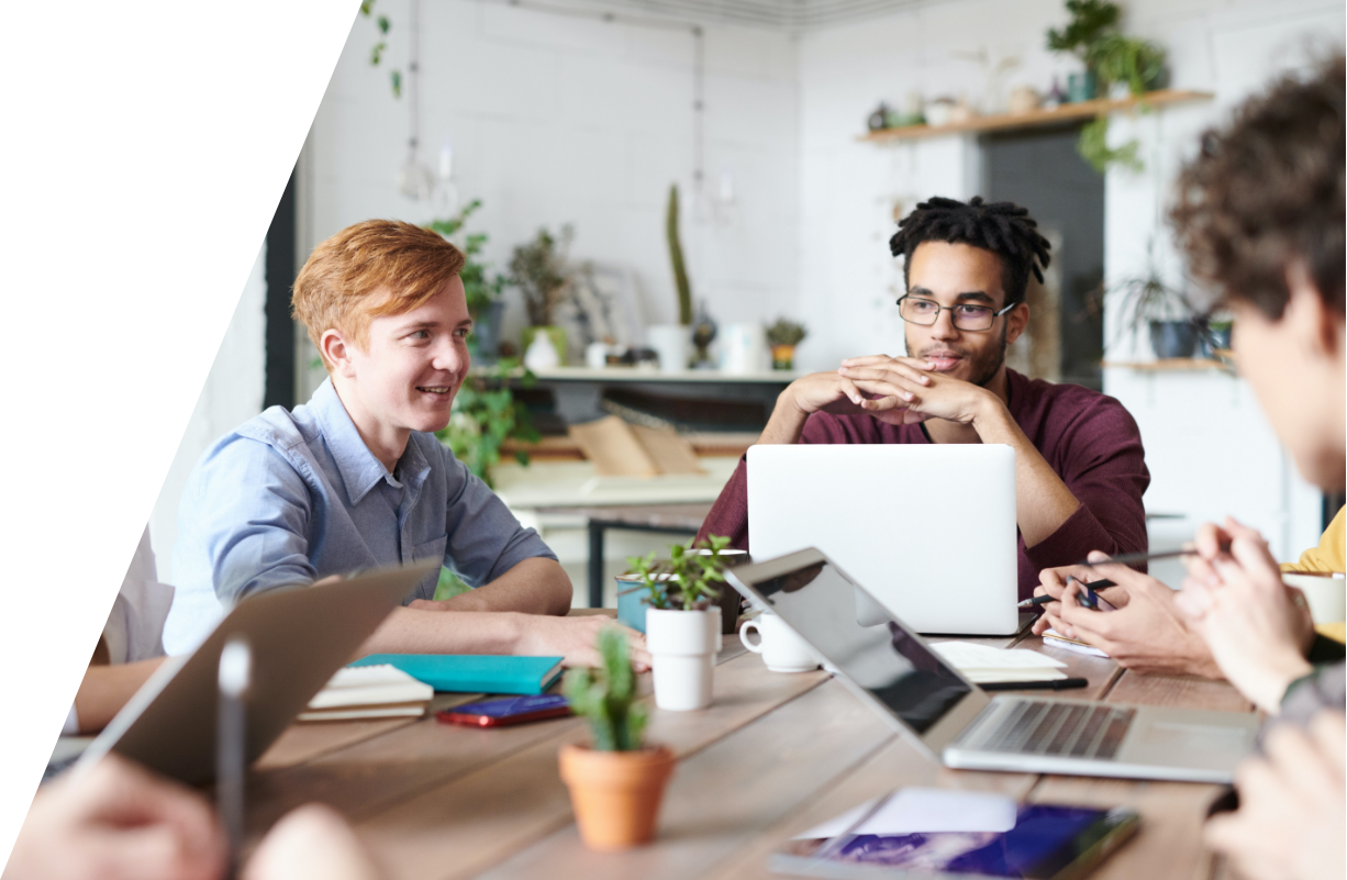 A team working together on laptops